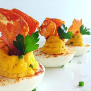 SRIRACHA DEVILED EGGS WITH CRISPY SERRANO HAM